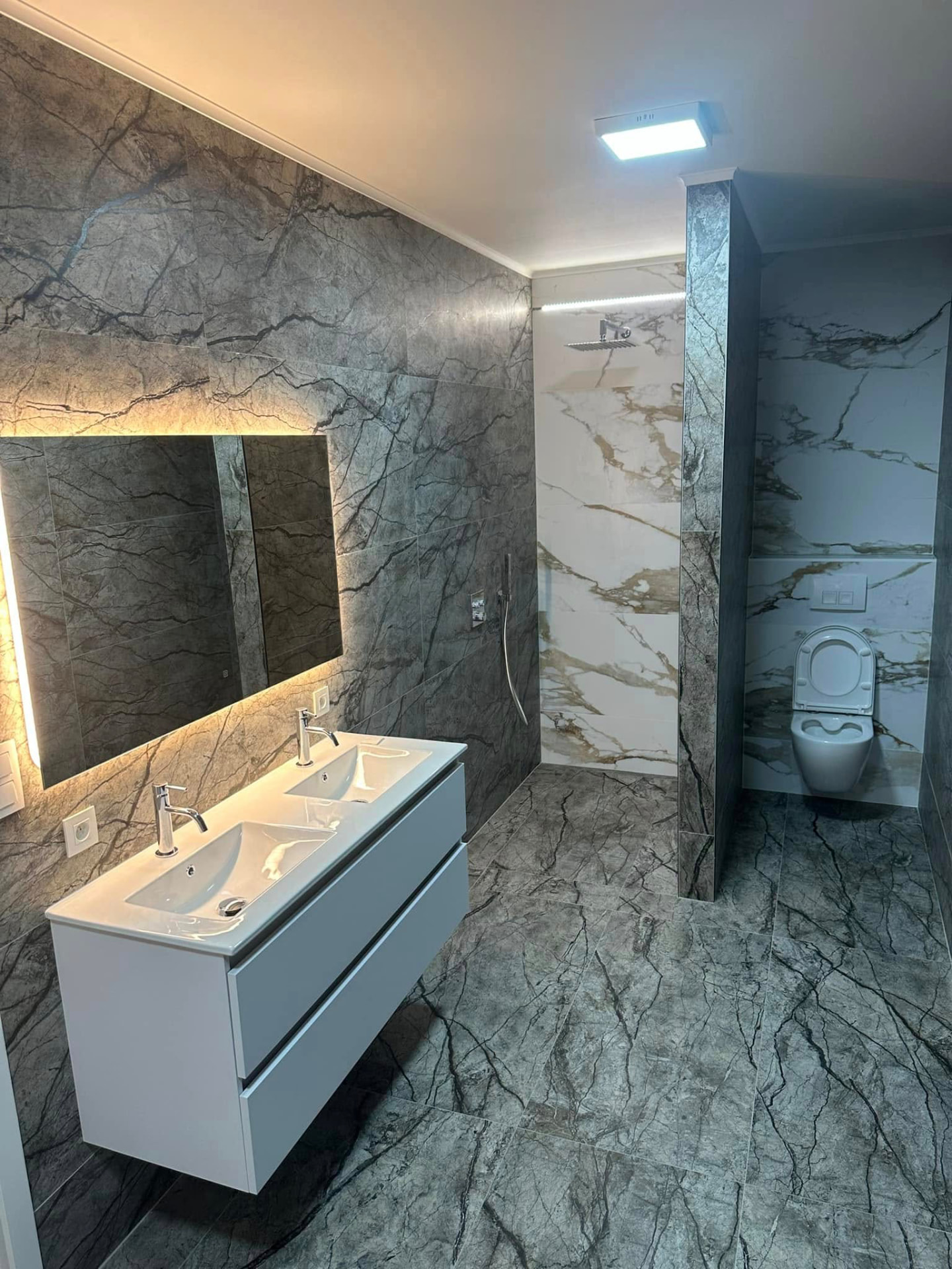 Badkamerrenovatie in marmerlook - Na